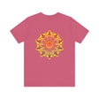 A close-up image of a vibrant mandala tee featuring intricate spiritual designs, symbolizing peace and harmony