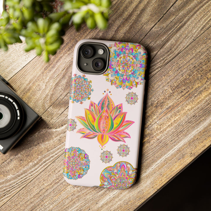 A light pink phone case with a mandala design featuring a beautiful lotus flower