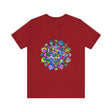 A colorful and intricate mandala design adorns this vibrant t-shirt, creating a stunning piece of wearable art