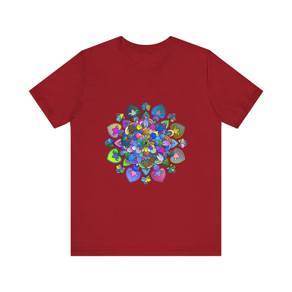 A colorful and intricate mandala design adorns this vibrant t-shirt, creating a stunning piece of wearable art