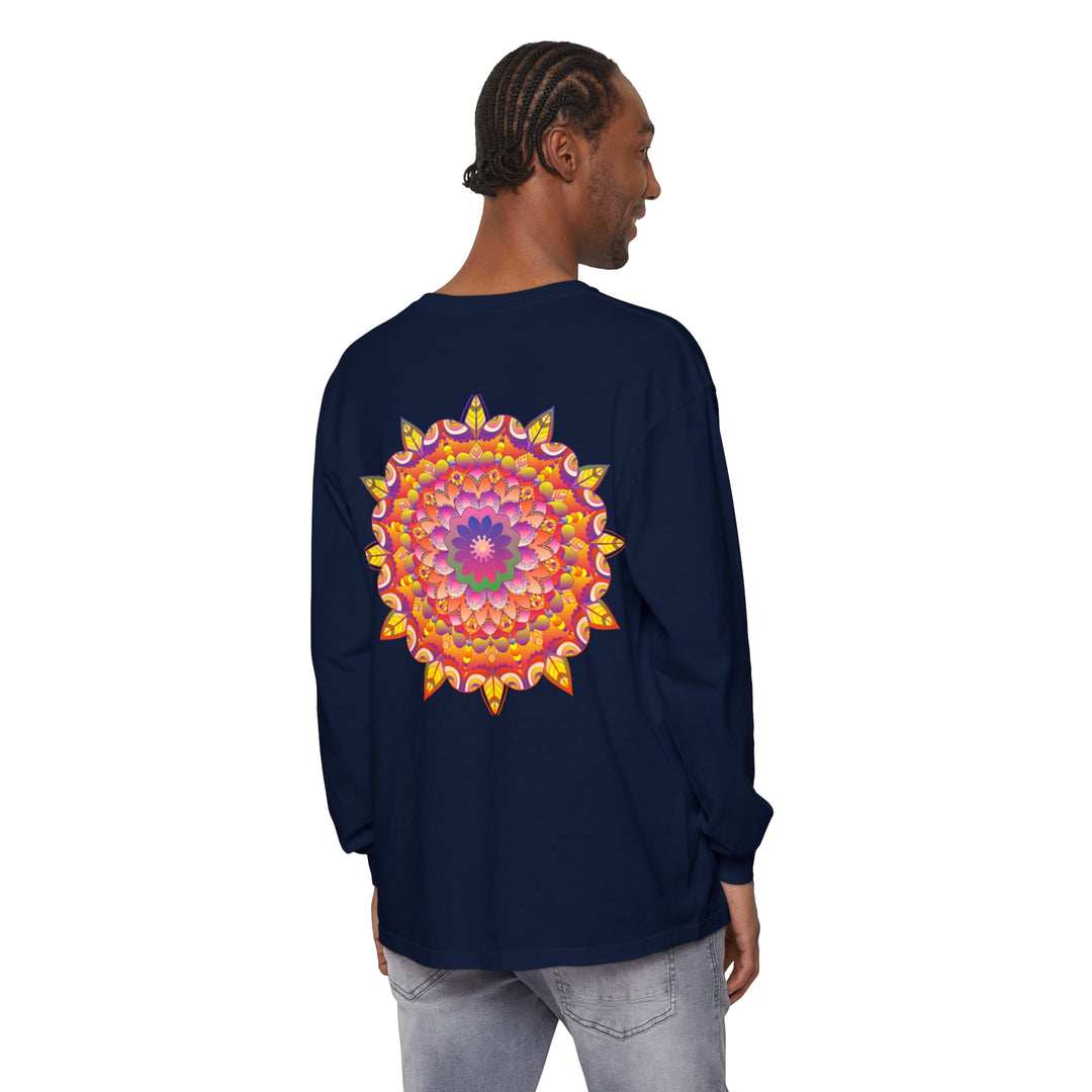 Colorful and intricate mandala design printed on a unisex long sleeve t-shirt