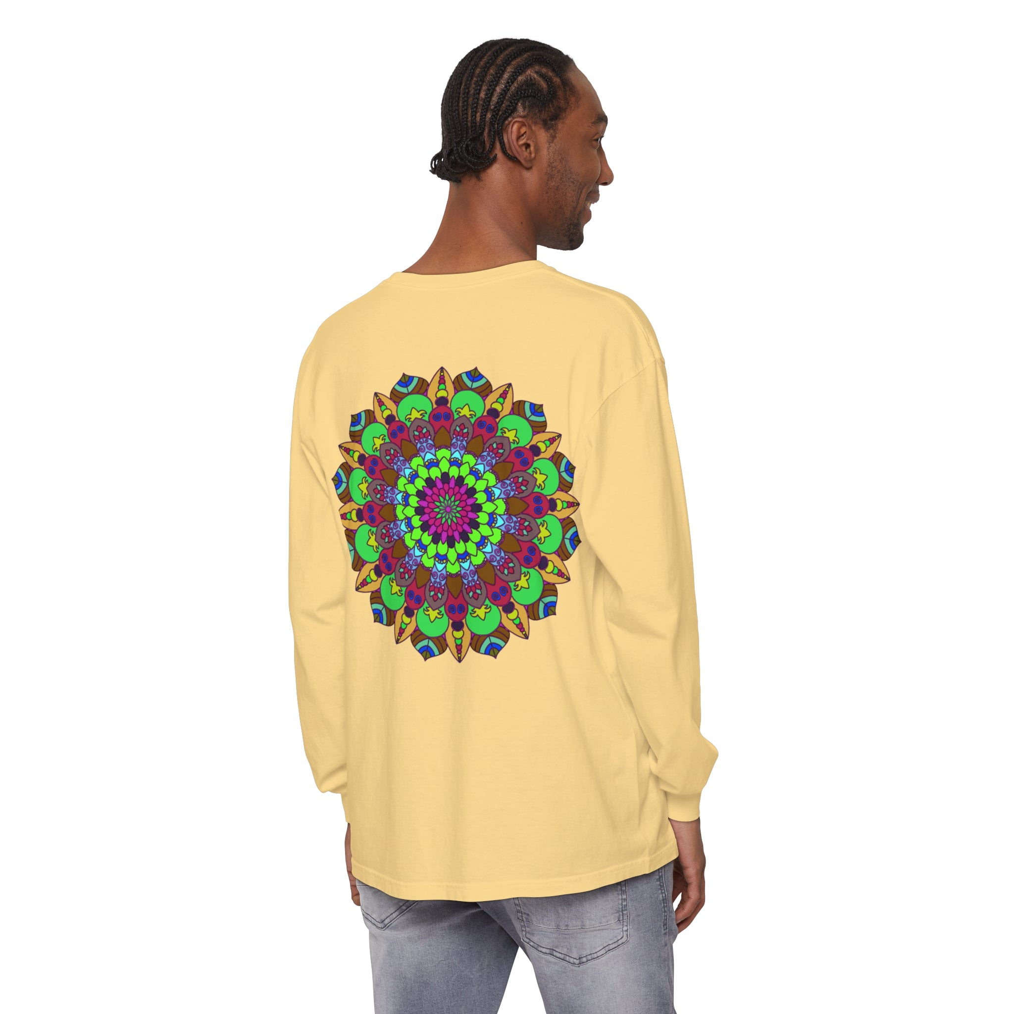 A vibrant and intricate mandala design adorns this unisex long sleeve t-shirt