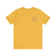 A close-up image of a vibrant mandala tee with intricate designs representing peace and harmony