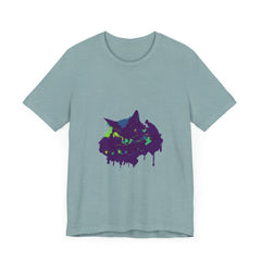 A close-up image of a Black Cat Mystery t-shirt with vibrant, colorful paint splatter design on a black background