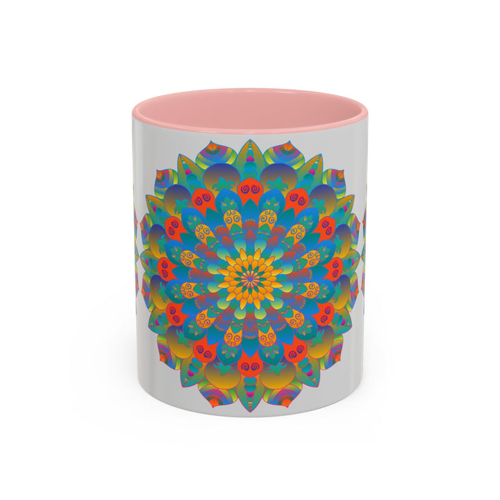 Handcrafted ceramic mug with vibrant mandala art in yellow, orange, and blue