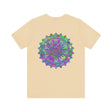 A colorful and intricate mandala design featured on a vibrant tee promoting spiritual peace and harmony