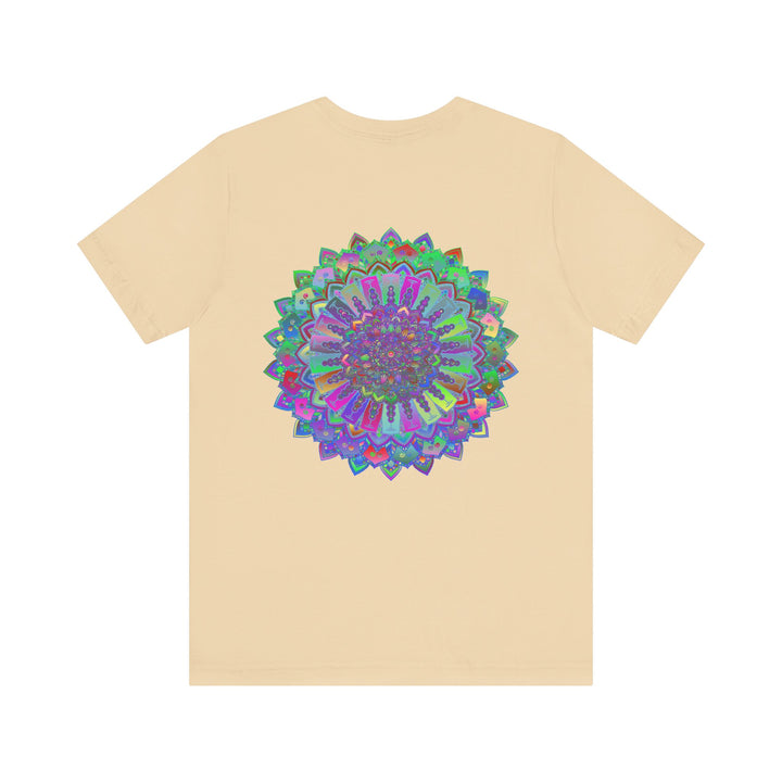 A colorful and intricate mandala design featured on a vibrant tee promoting spiritual peace and harmony