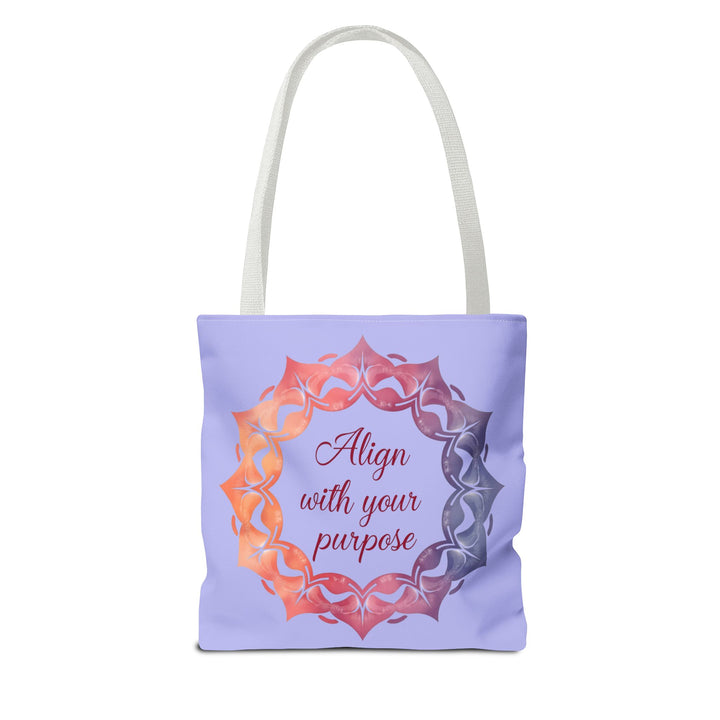 A vibrant orange and purple Mandala Tote Bag, designed for everyday use and carrying a purposeful message