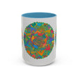 A beautiful ceramic mug featuring a colorful floral mandala design