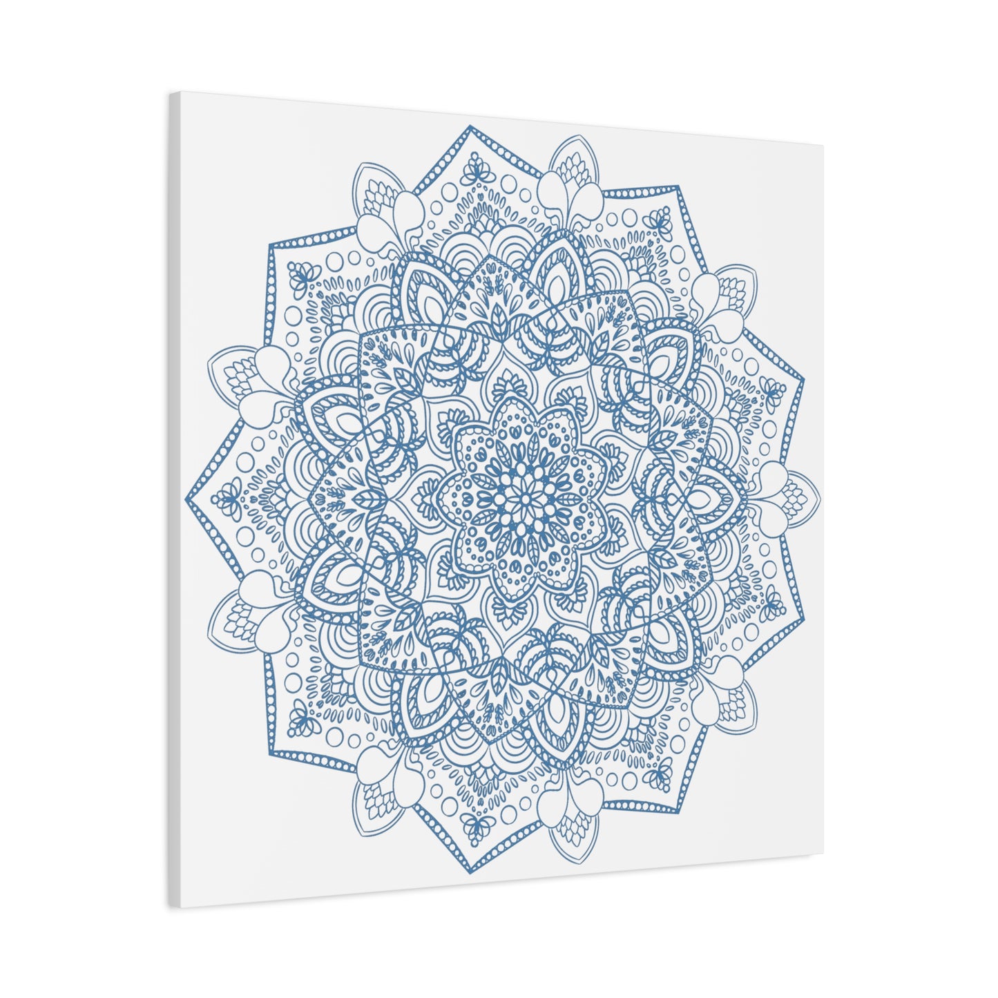 Handmade Mandala Art depicting a steel blue design on matte canvas, stretched and 125 thick