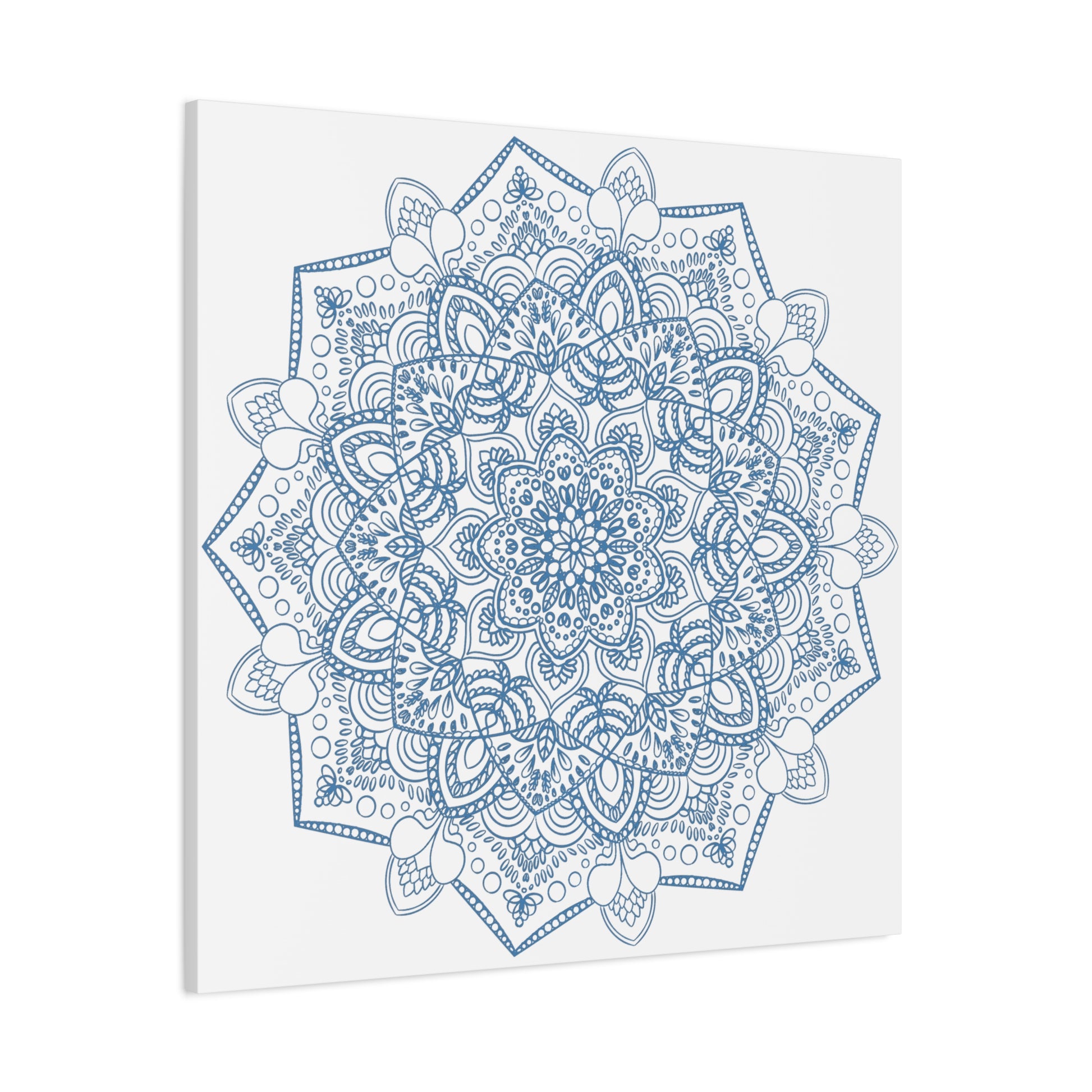 Handmade Mandala Art depicting a steel blue design on matte canvas, stretched and 125 thick