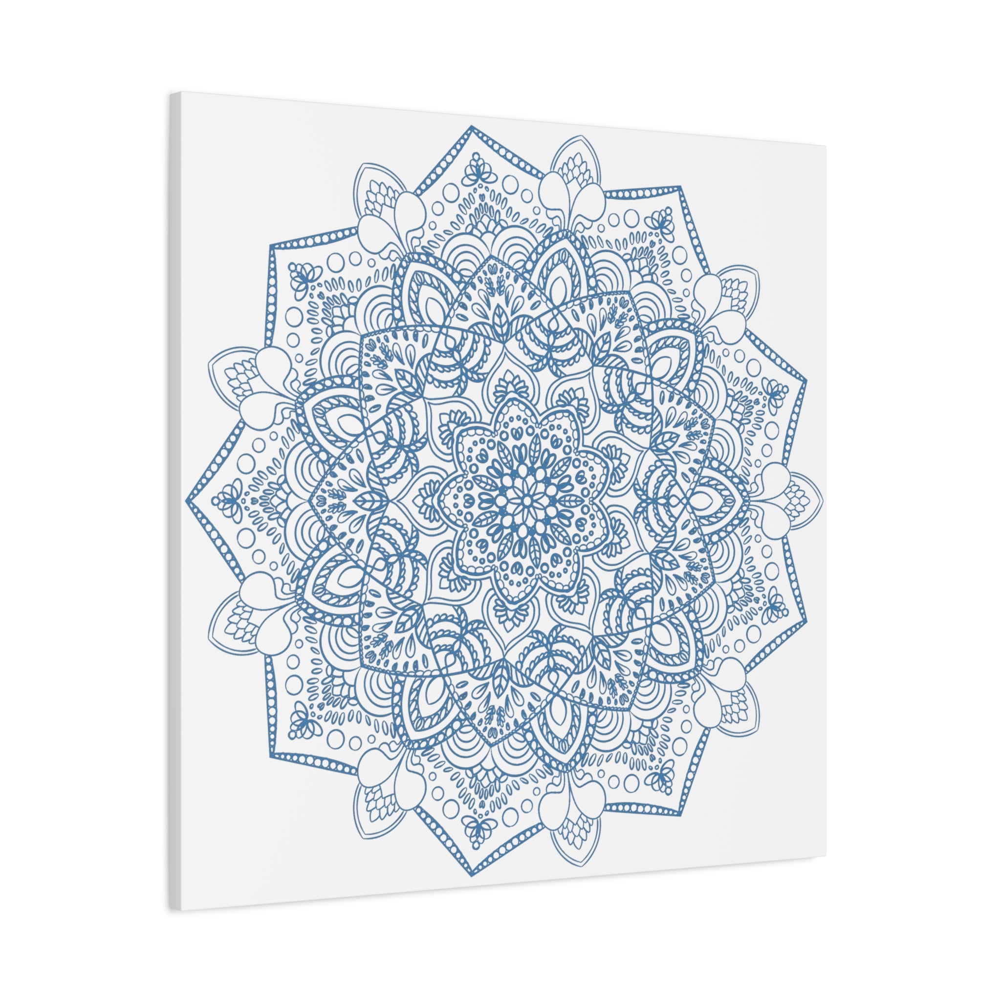 Handmade Mandala Art depicting a steel blue design on matte canvas, stretched and 125 thick