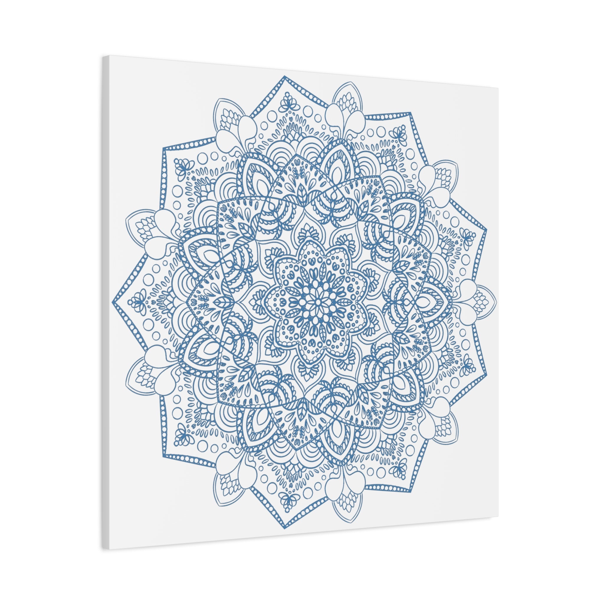 Handmade Mandala Art depicting a steel blue design on matte canvas, stretched and 125 thick