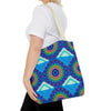 Vibrant and intricately designed mandala tote bag with a colorful and eye-catching pattern perfect for carrying belongings or using as a stylish accessory