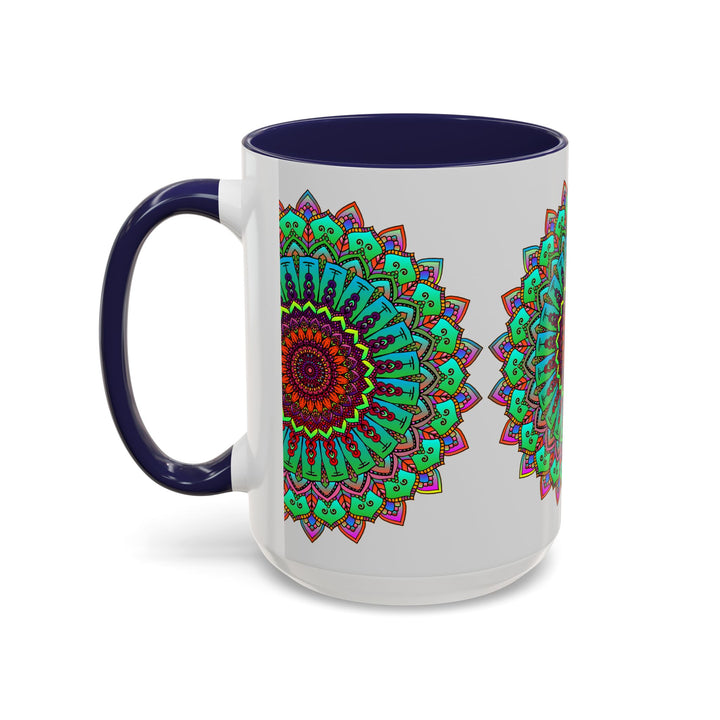 A light grey ceramic mug with a colorful mandala art design