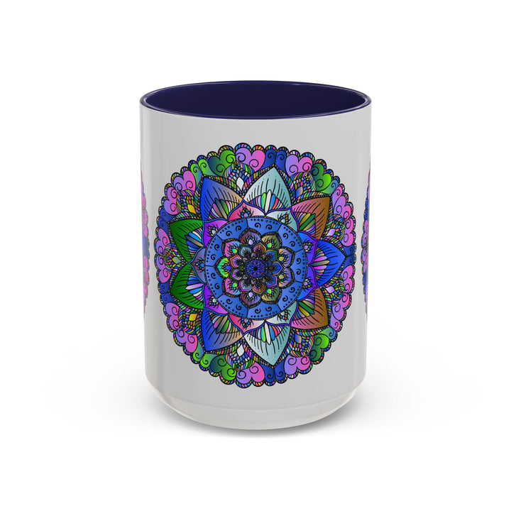 A vibrant and intricate mandala design adorns a ceramic mug, creating a peaceful and colorful piece of art