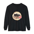 A watercolor illustration of a peaceful sleeping cat nestled in a bowl on a long sleeve t-shirt
