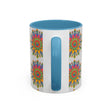Colorful and intricate mandala pattern on a grey ceramic mug