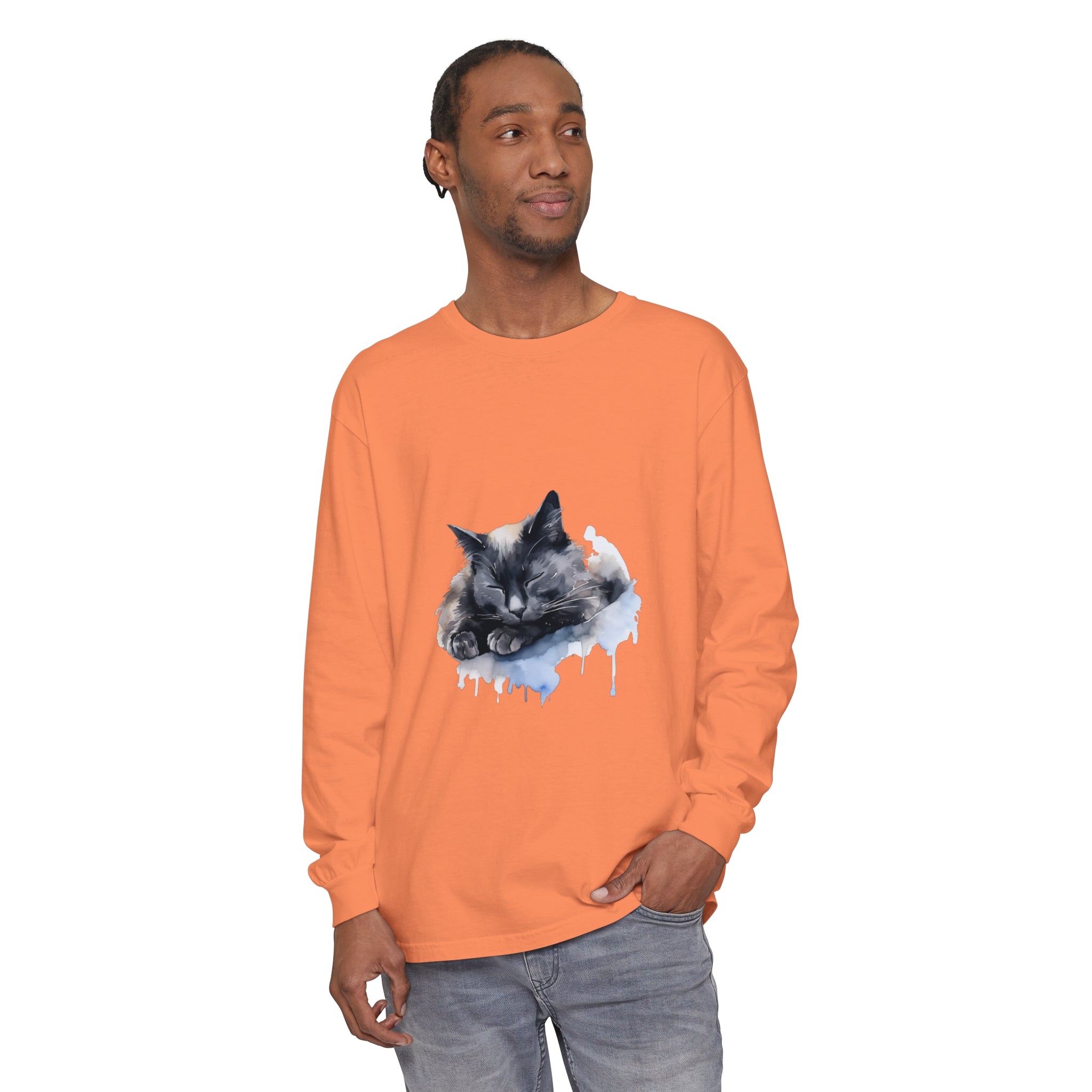 A watercolor illustration of a sleeping cat on a t-shirt