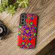 Hand drawn mandala art in red, intricate and detailed design phone case