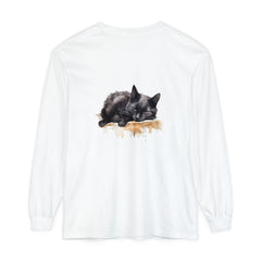 A detailed watercolor illustration of a black cat sleeping on a t-shirt