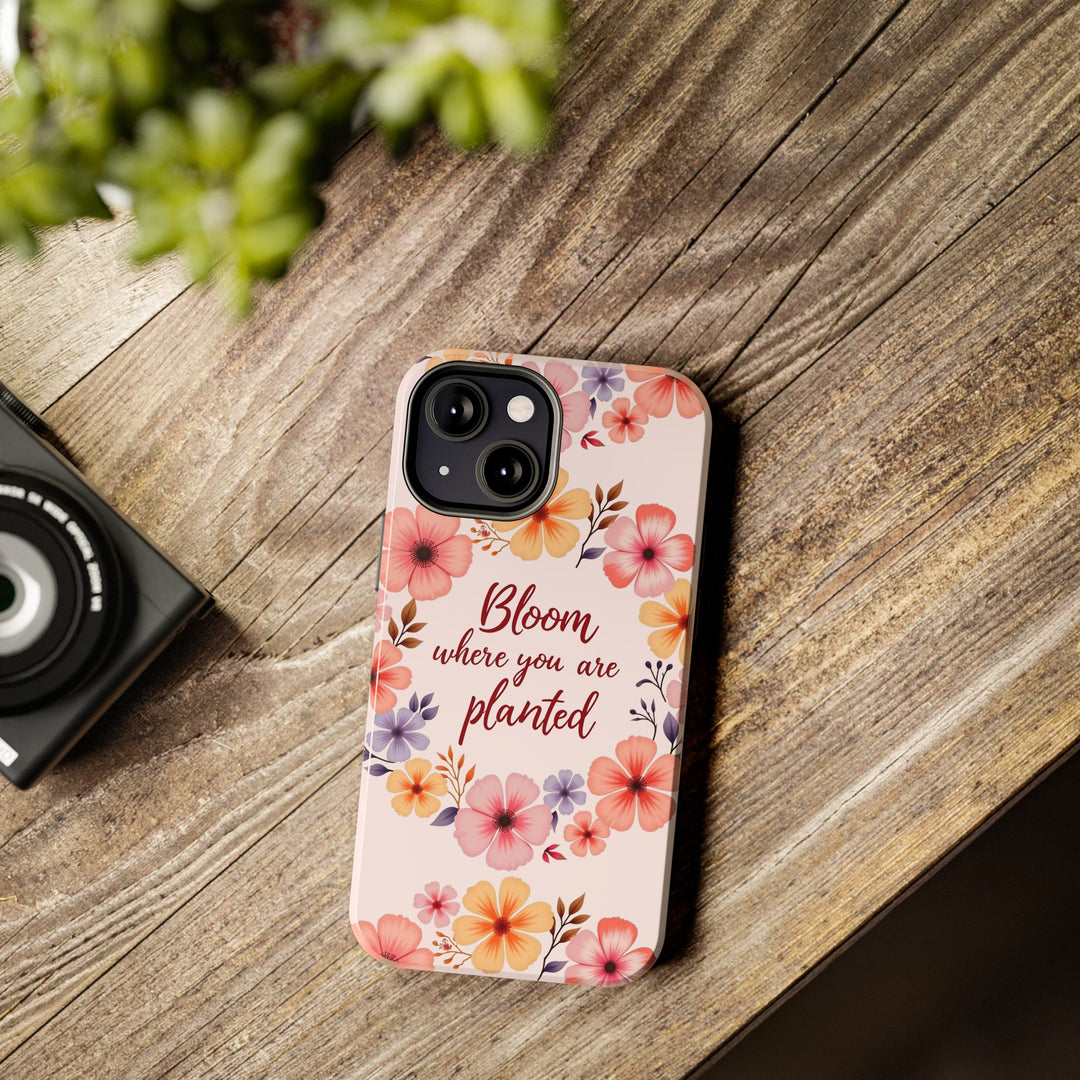 Phone case with a light pink flower garland bloom design, perfect for adding a touch of natural beauty to your device