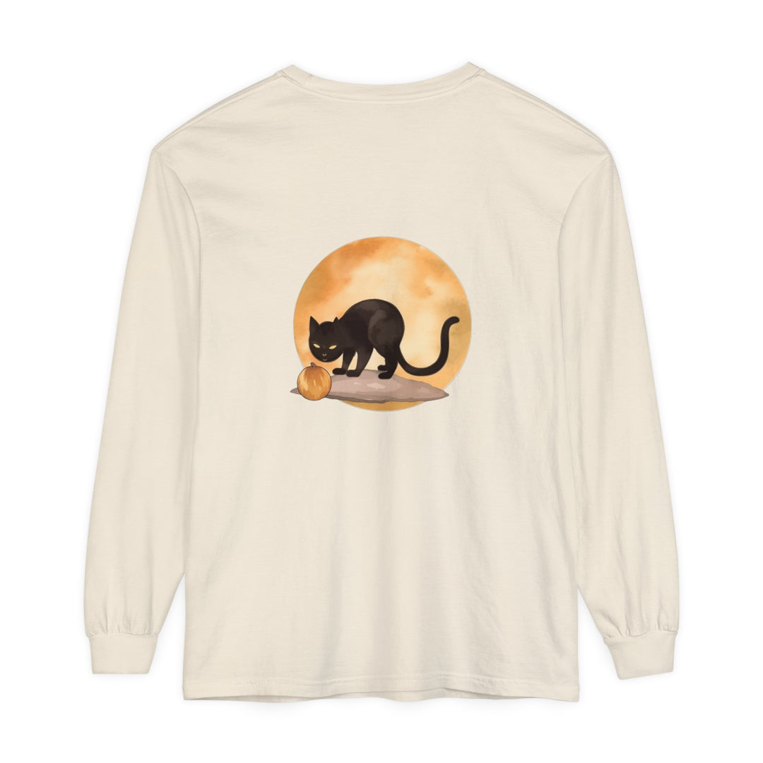 Black cat with arched back and glowing yellow eyes against full moon on Halloween-themed t-shirt