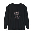 Adorable black kitten with mesmerizing yellow eyes on a long sleeve T-shirt
