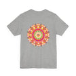 A vibrant mandala tee featuring intricate patterns and colors symbolizing spiritual peace and harmony