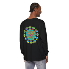 Close-up image of a vibrant and colorful tie-dye long sleeve t-shirt with a psychedelic mandala pattern