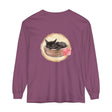 A long sleeve t-shirt featuring a watercolor illustration of a sleeping cat in a bowl
