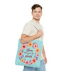 Colorful floral tote bag with the quote 'Bloom Where You Are Planted' available in 3 different sizes