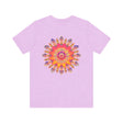 A colorful and intricate mandala design tee, symbolizing spiritual peace and harmony