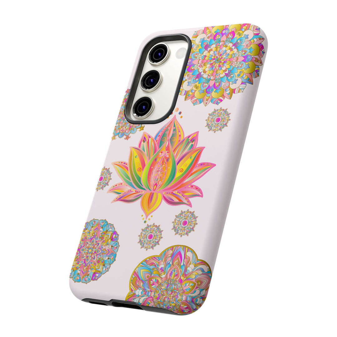 A light pink phone case featuring a mandala design with lotus flower pattern