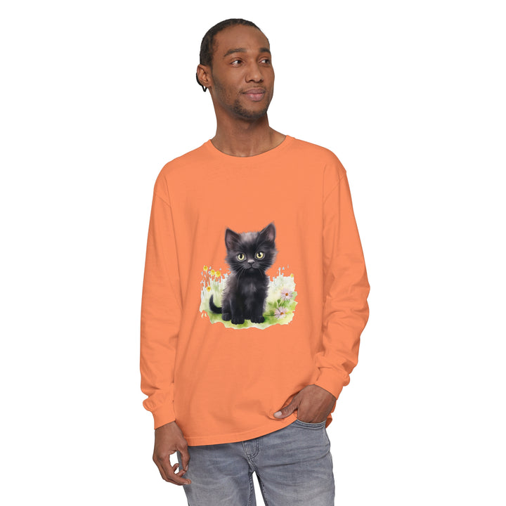 Adorable black kitten surrounded by colorful flowers on a long sleeve t-shirt