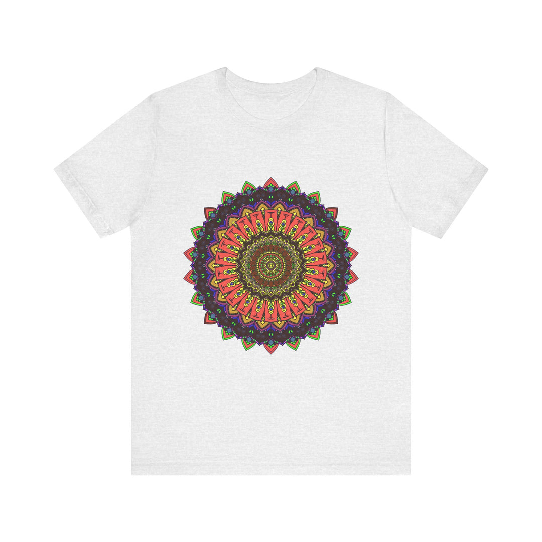 Vibrant and intricate mandala design tee in various shades of blue, pink, and yellow