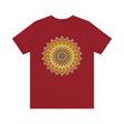 Vibrant Mandala Tee featuring intricate design in shades of blue, green, and yellow, promoting peace and harmony with its calming and uplifting presence