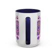 Handcrafted ceramic mandala mug with intricate purple and pink floral design