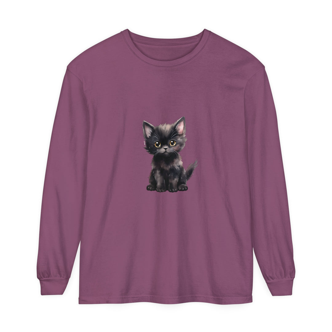 A close-up image of a cute black kitten with vibrant yellow eyes printed on a long sleeve t-shirt