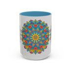 Vibrant yellow, orange, and blue mandala art mug with intricate design