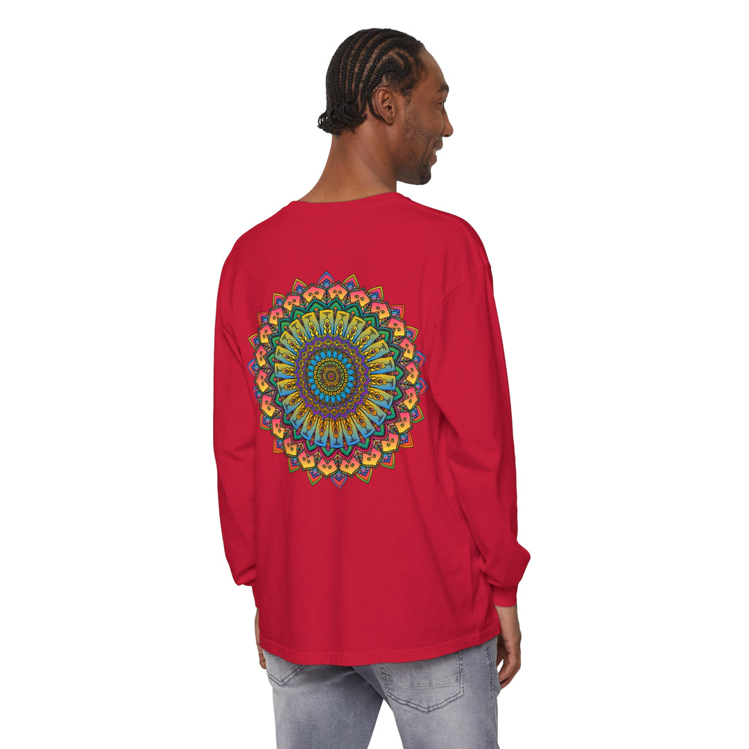 A detailed and colorful mandala design on a unisex long sleeve t-shirt