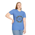 Beautiful white t-shirt with a floral garland design and the calming message 'Breathe in Peace Exhale Stress' printed in elegant script