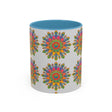 Colorful mandala mug featuring intricate and vibrant art on a grey background