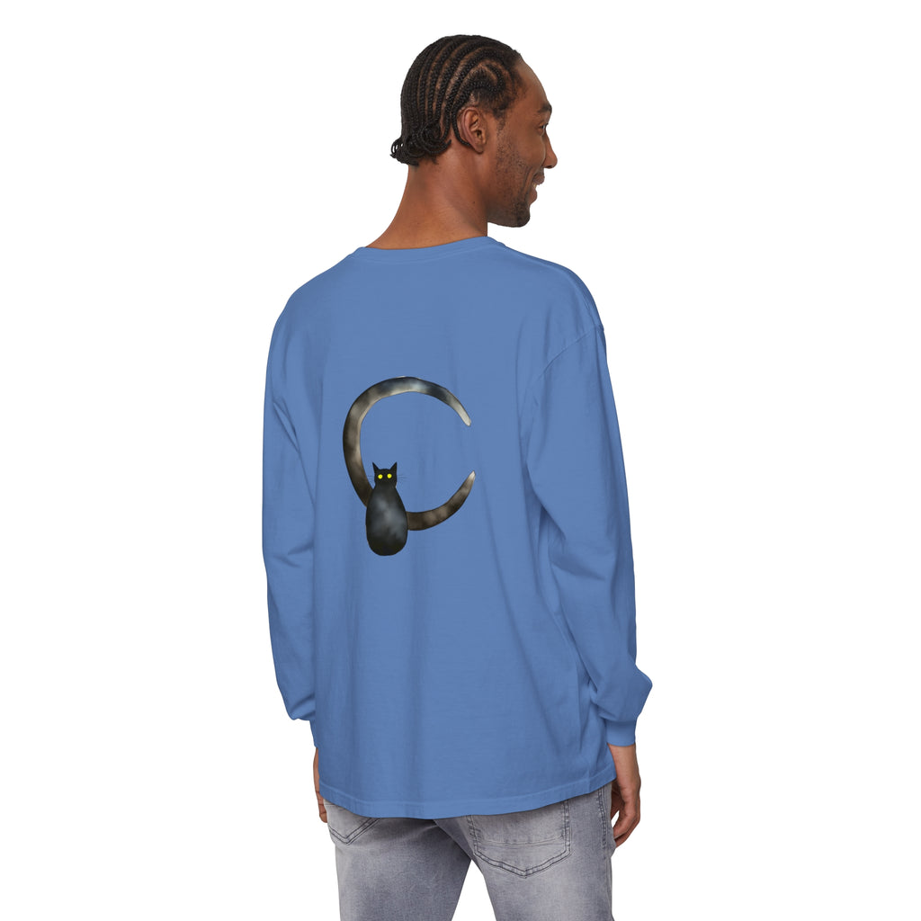 A black cat perched on a crescent moon, printed on a t-shirt