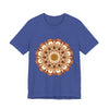 A close-up image of a brown and orange Intricate Mandala Tee, featuring intricate and detailed mandala designs in warm earthy colors