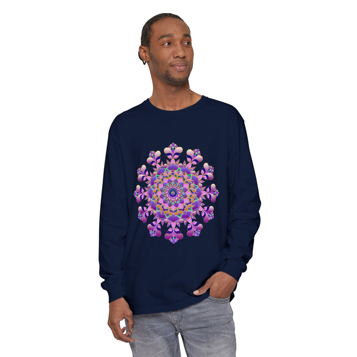 A close-up image of a unisex long sleeve T-shirt featuring an intricate mandala design on the front