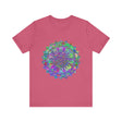A vibrant and detailed mandala design adorns this colorful t-shirt