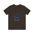 A vibrant blue t-shirt featuring a mysterious and cool cat design