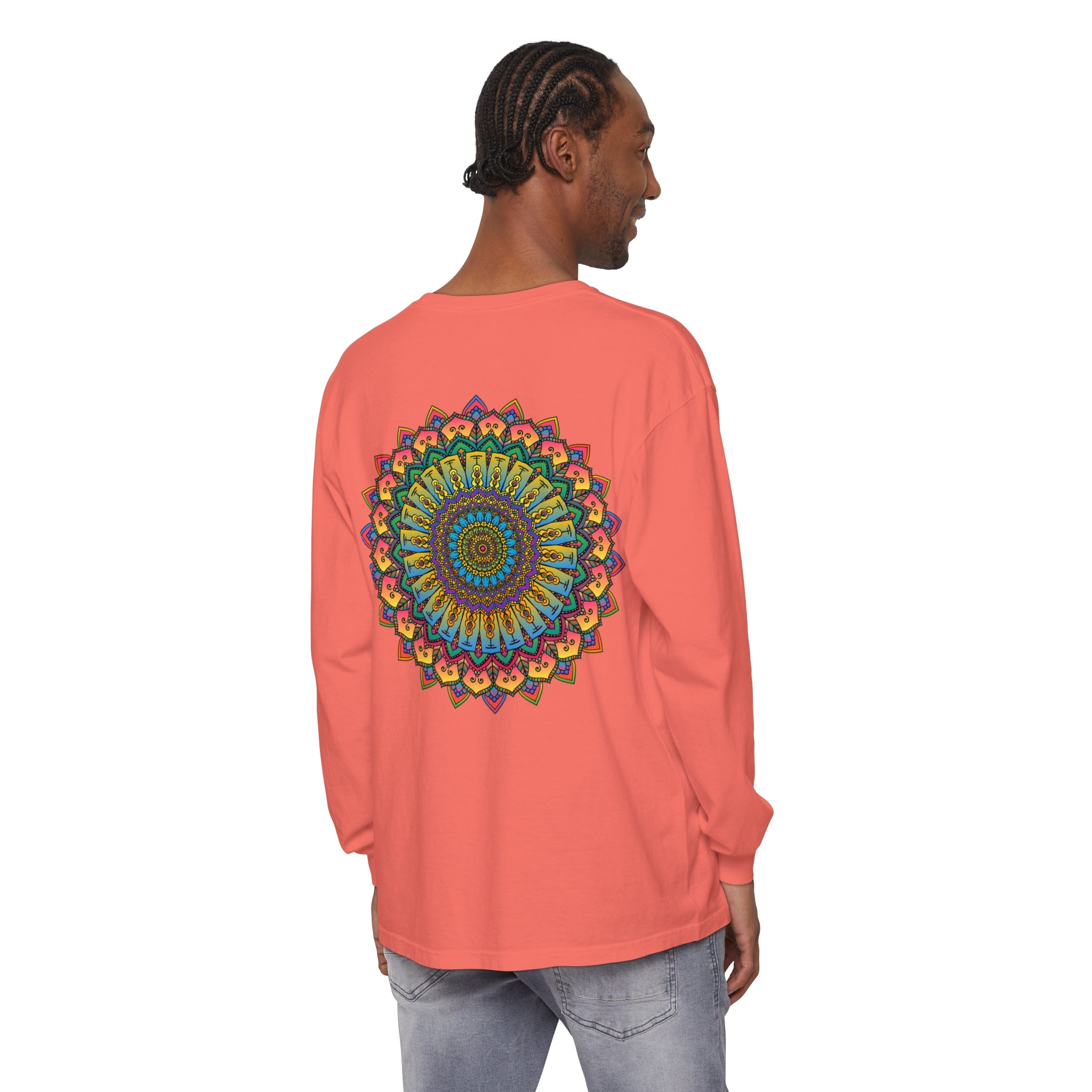 A close-up image of a colorful, intricate mandala design on a unisex long sleeve t-shirt