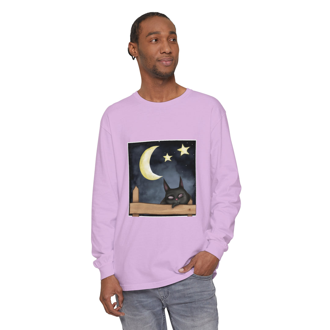 A black t-shirt featuring a sleepy cat under the night sky